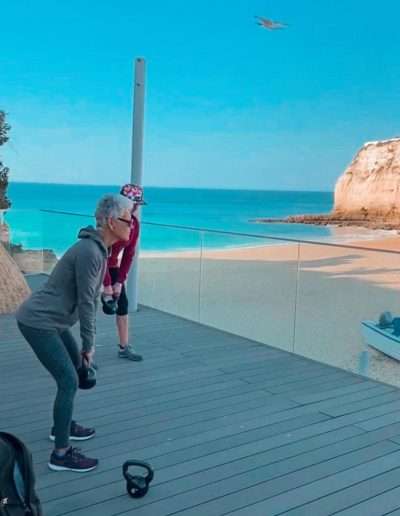 Kettlebell training on beach in Algarve